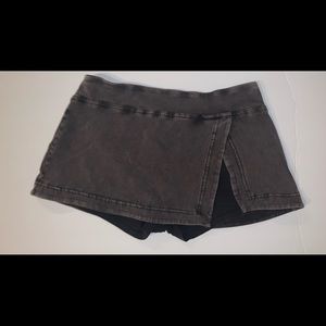 Free People Movement Hot Shot Mini Skort in the color Black. Size Small.